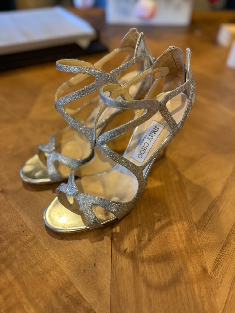 Jimmy Choo "Leslie" Curvy-Caged Glitter Sandals.